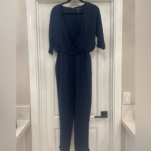 White House Black Market Jumpsuit. Navy. Size 4